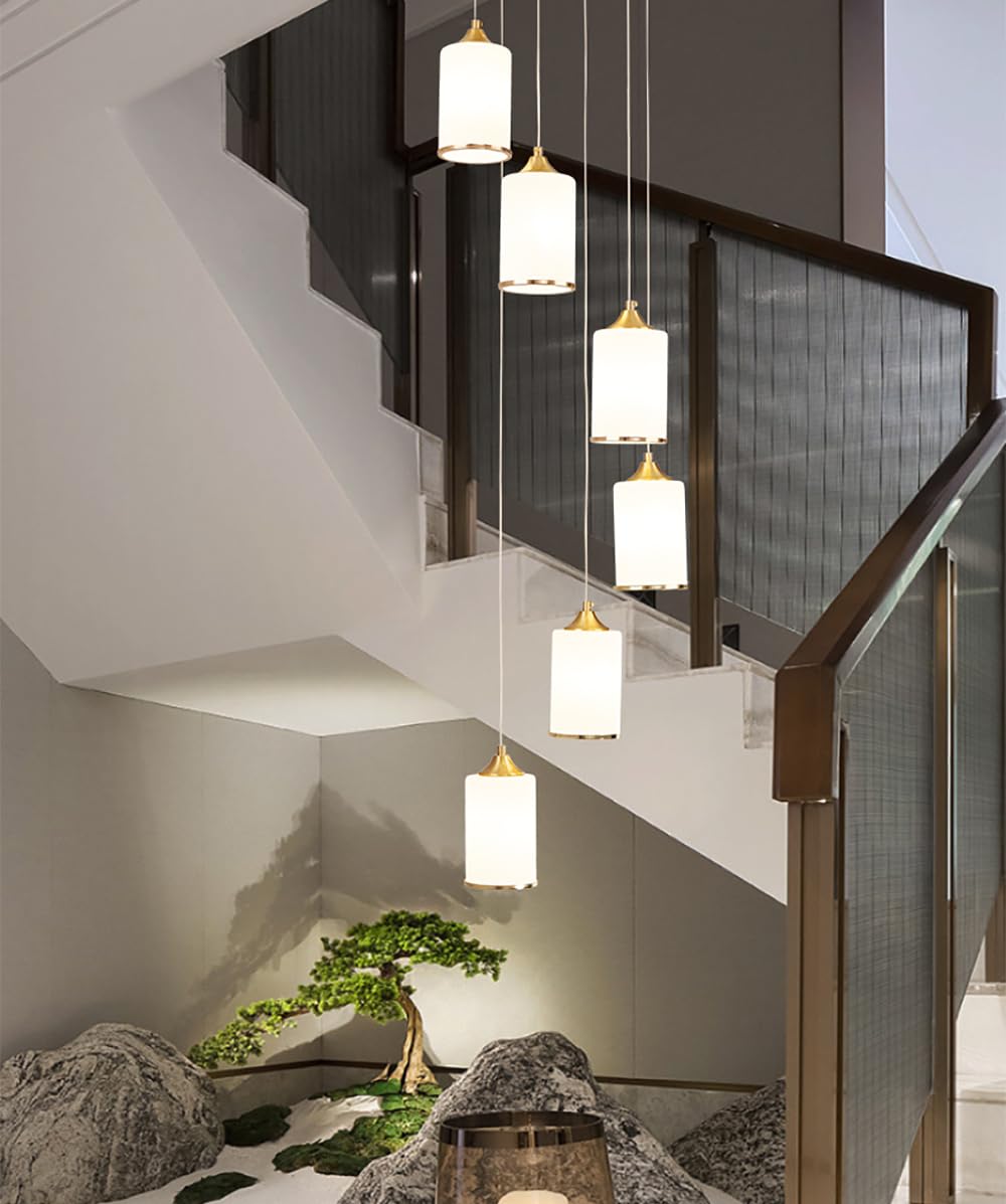 Luminaire suspendu pour immeuble duplex : réglage hauteur pour grand escalier moderne