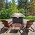 Outdoor Propane Fire Pit Table - CSA Approved Safe 50,000BTU Auto-Ignition Propane Gas Fire Table - Rattan Panel, Glass Wind Guard, Black Tempered Glass Tabletop, Clear Glass Rock - SereneLife SLFPTL