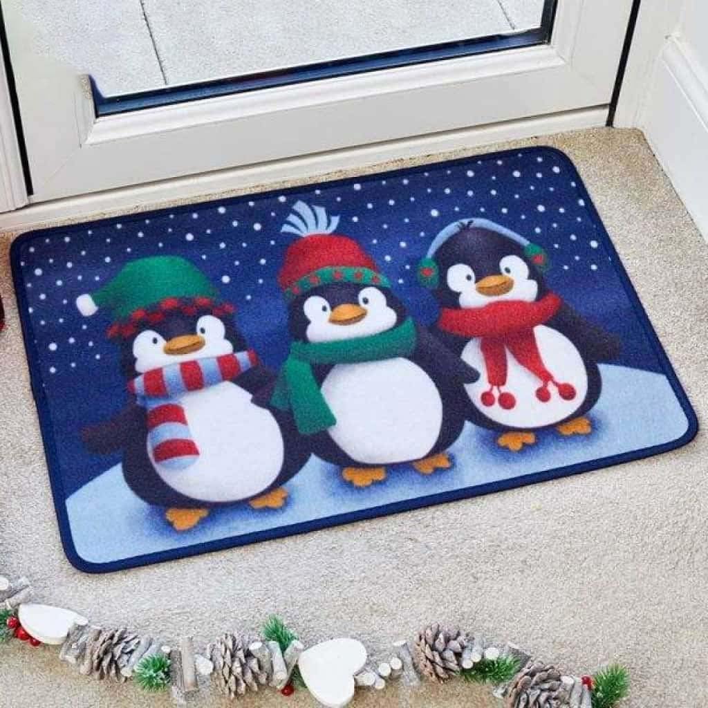 Paillasson de Noël trois pingouins givrés pour une entrée extérieure accueillante