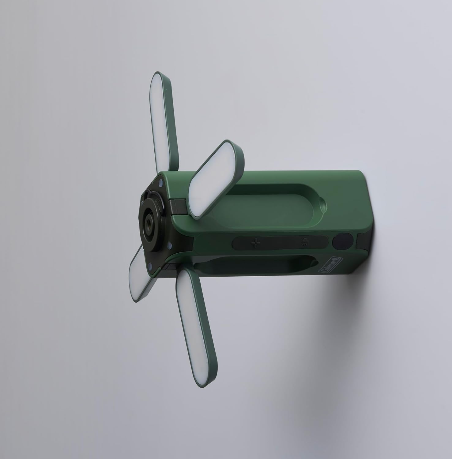 Lado view of the Coleman Compact Panel Light with panels extended, showing its versatile mounting options.