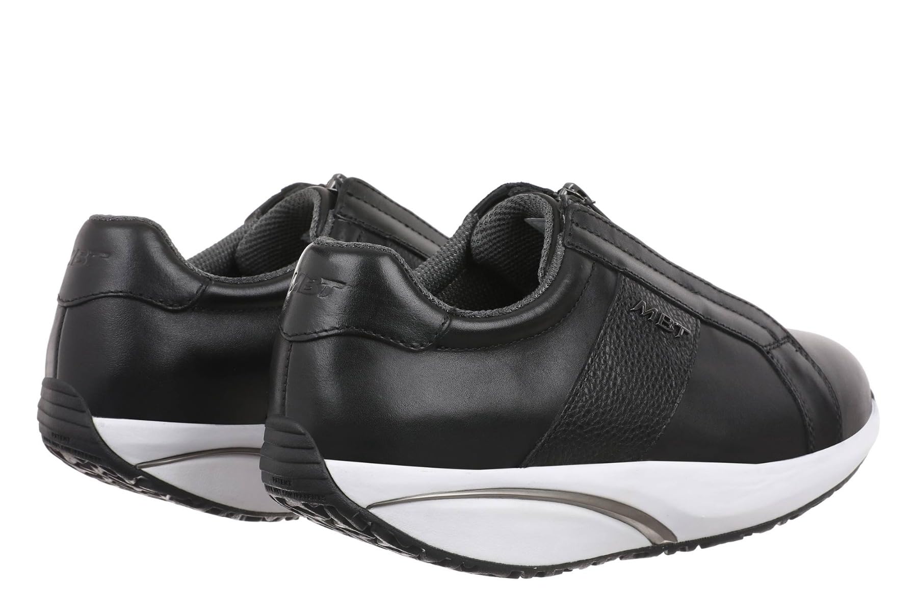 MBT AISAI Ledersneaker für Damen. Nappadesign mit Details aus Strukturiertem Leder. Frontaler Reißverschluss für leichten Einstieg.