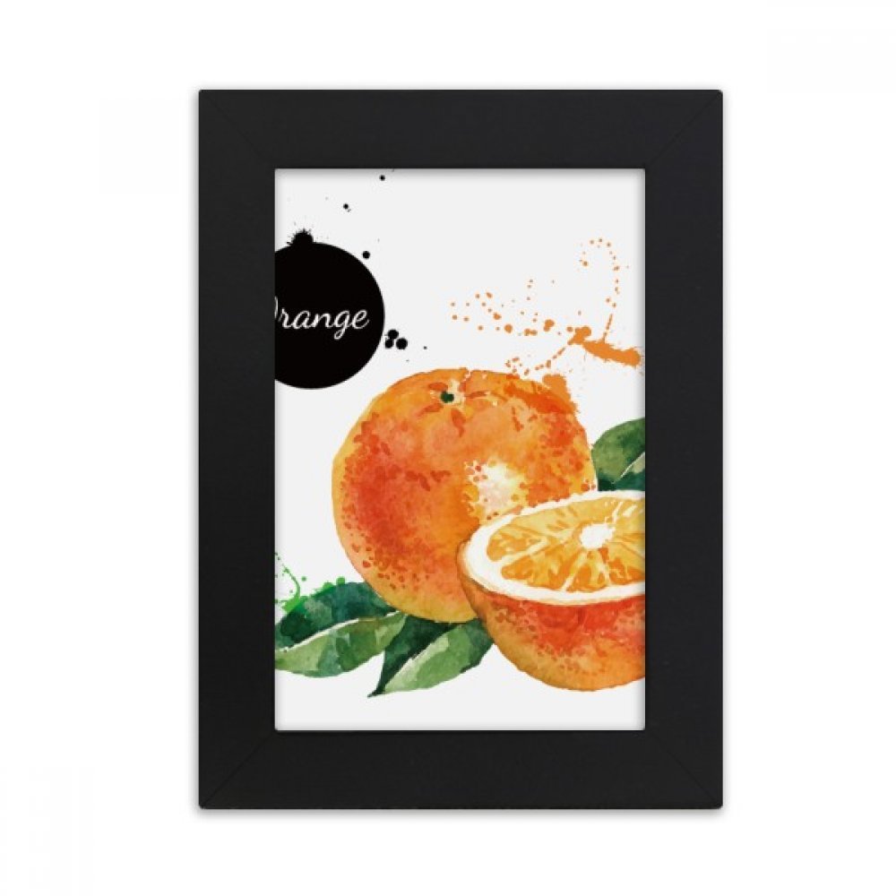 Cadre photo noir peinture orange pour égayer un salon sombre