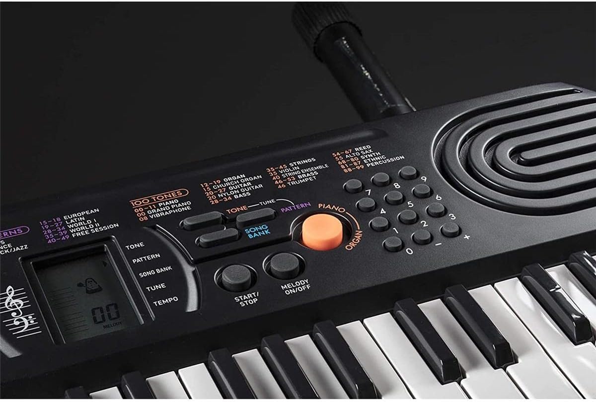 Close-up of the tone selection buttons and numeric keypad on the Casio SA-76.