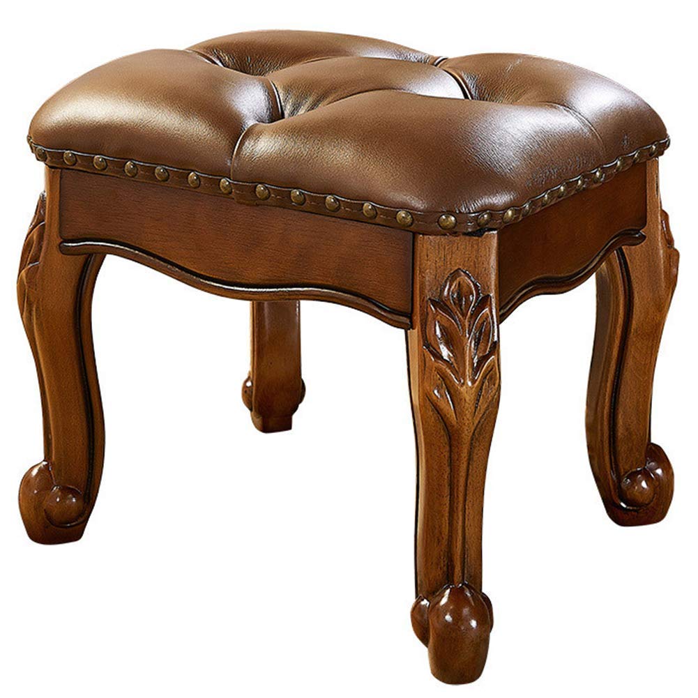 Petits repose-pieds en cuir marron parfaits pour votre coin lecture cocooning