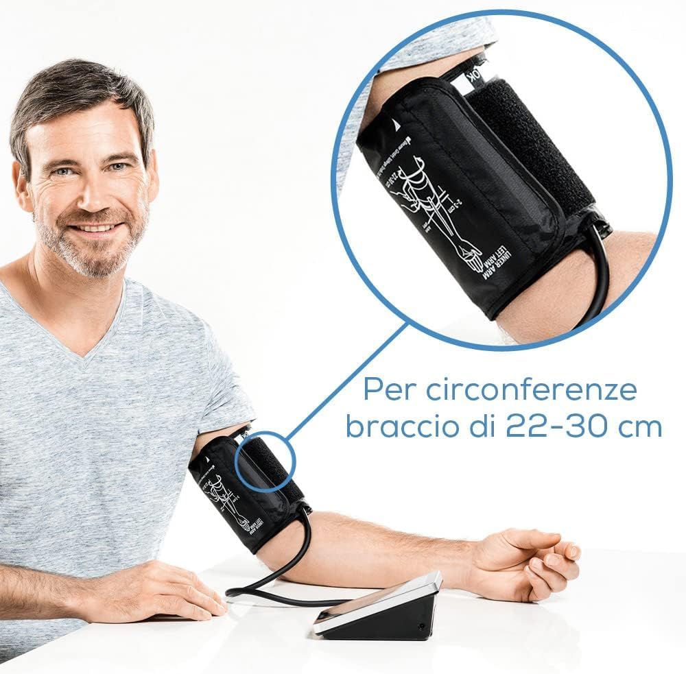 Man properly wearing the Beurer BM 58 arm cuff, showing arm circumference range