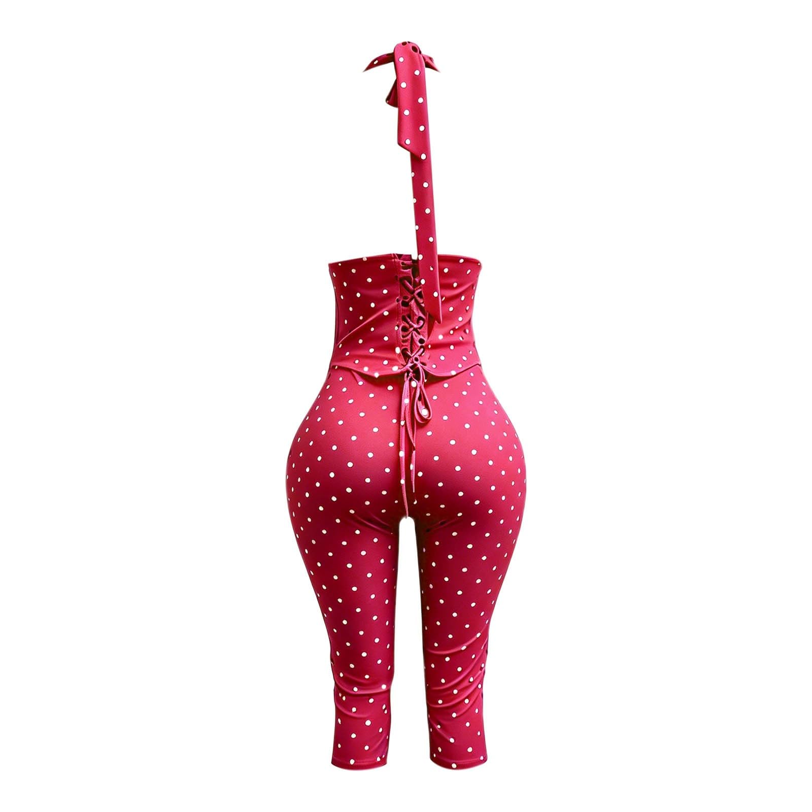 Tuta intera con scollo a pois, corsetto, cerniera, vita e polsini