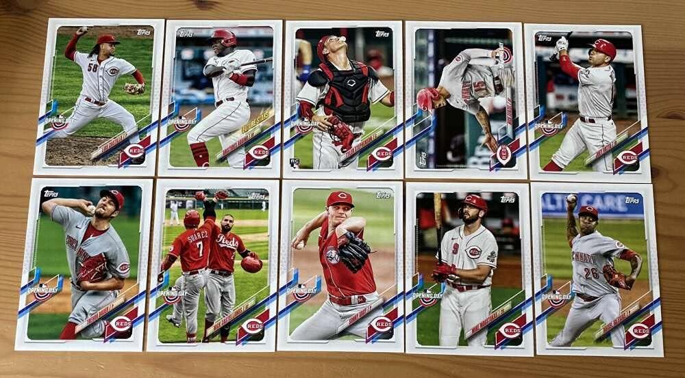 2021 Topps Opening Day Baseball Cincinnati Reds Base MLB Hand Collated Team Set in Near Mint to Mint Condition of 10 Cards: 2 Luis Castillo 16 Aristides Aquino 20 Tyler Stephenson RC 36 Nick Senzel 66 Joey Votto 69 Trevor Bauer 78 Nick Castellanos 126 Sonny Gray 129 Mike Moustakas 151 Raisel Iglesias