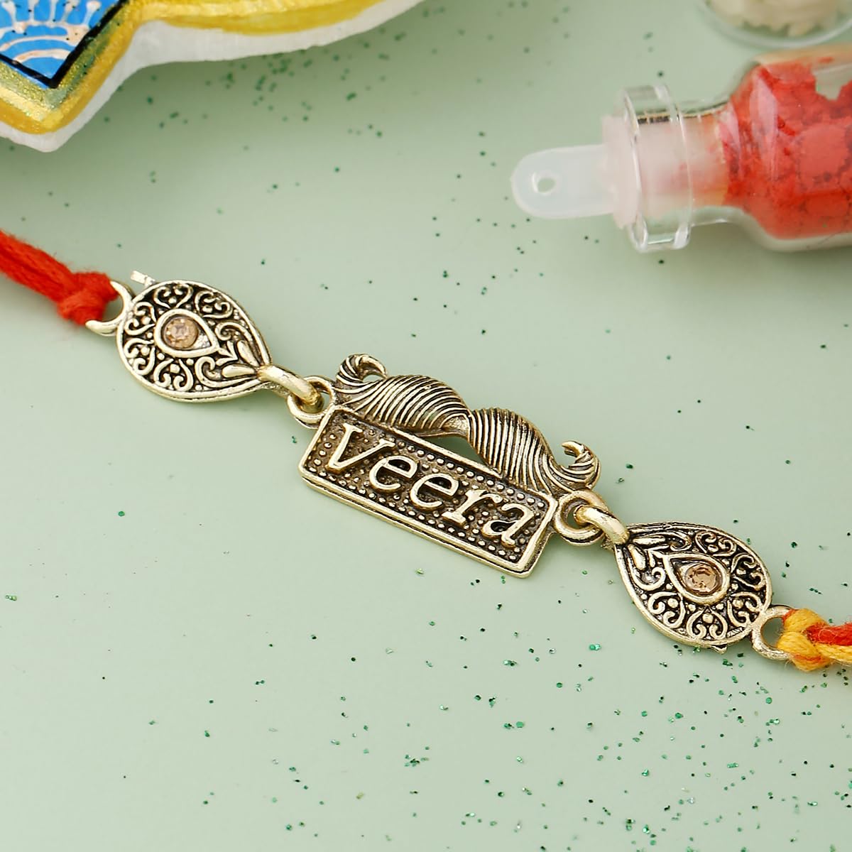 Antique Veera Rakhi With Roli Chawal Pack