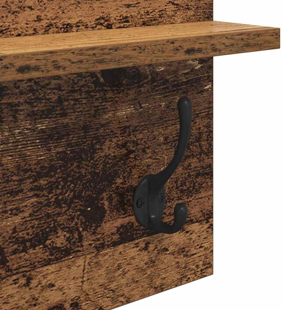 Close-up view of a black metal coat hook on one of the vidaXL coat racks.