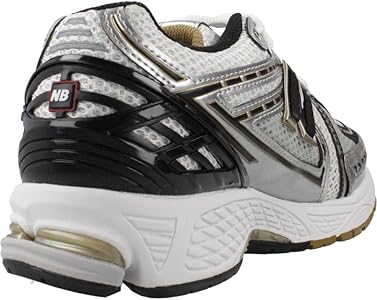 Amazon.com | New Balance 1906R Shoes - Metallic Silver