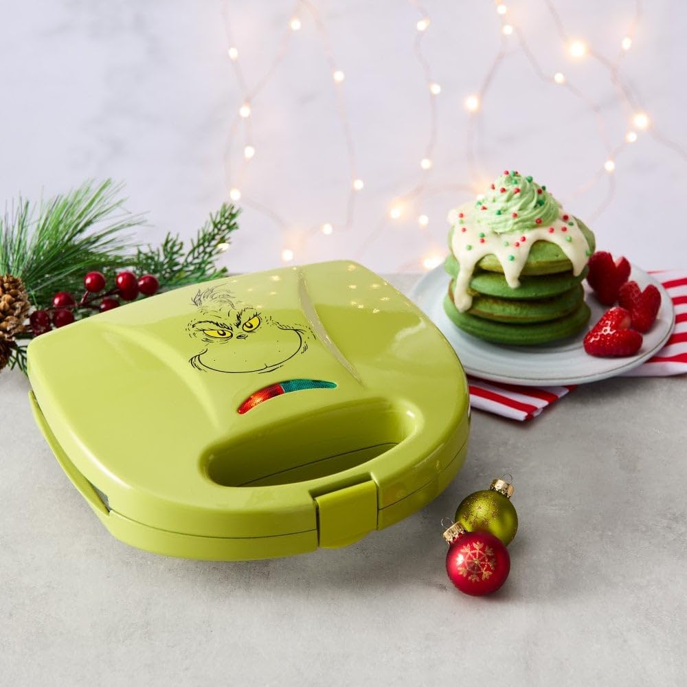 The Grinch from Daewoo Electricals - Máquina para hacer panqueques del Reino Unido, placas antiadherentes, verde, mango de bloqueo, almacenamiento de cables, 23 pulgadas de ancho x 21,6 pulgadas de