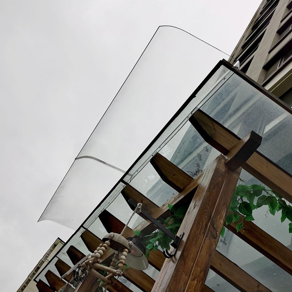 Auvent de porte en polycarbonate avec finition élégante pour une entrée moderne