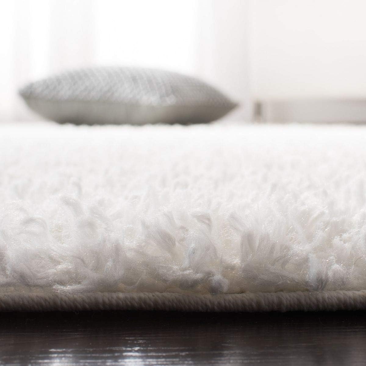 August Shag White Synthetic Area Rug 2' x 5'