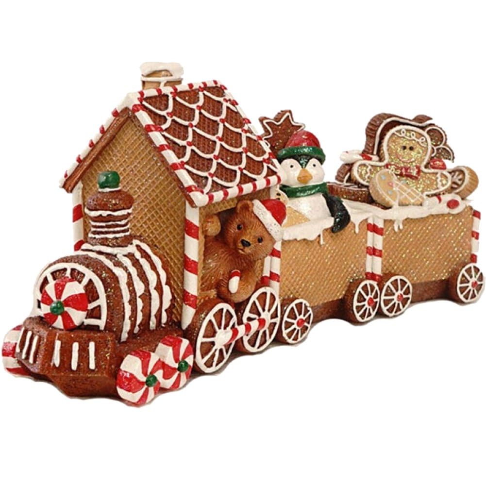 Train en pain d'épices de Noël posé sur la cheminée du salon familial