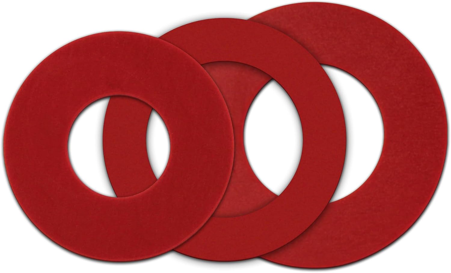 Three red rubber dual flush toilet seals of varying sizes.