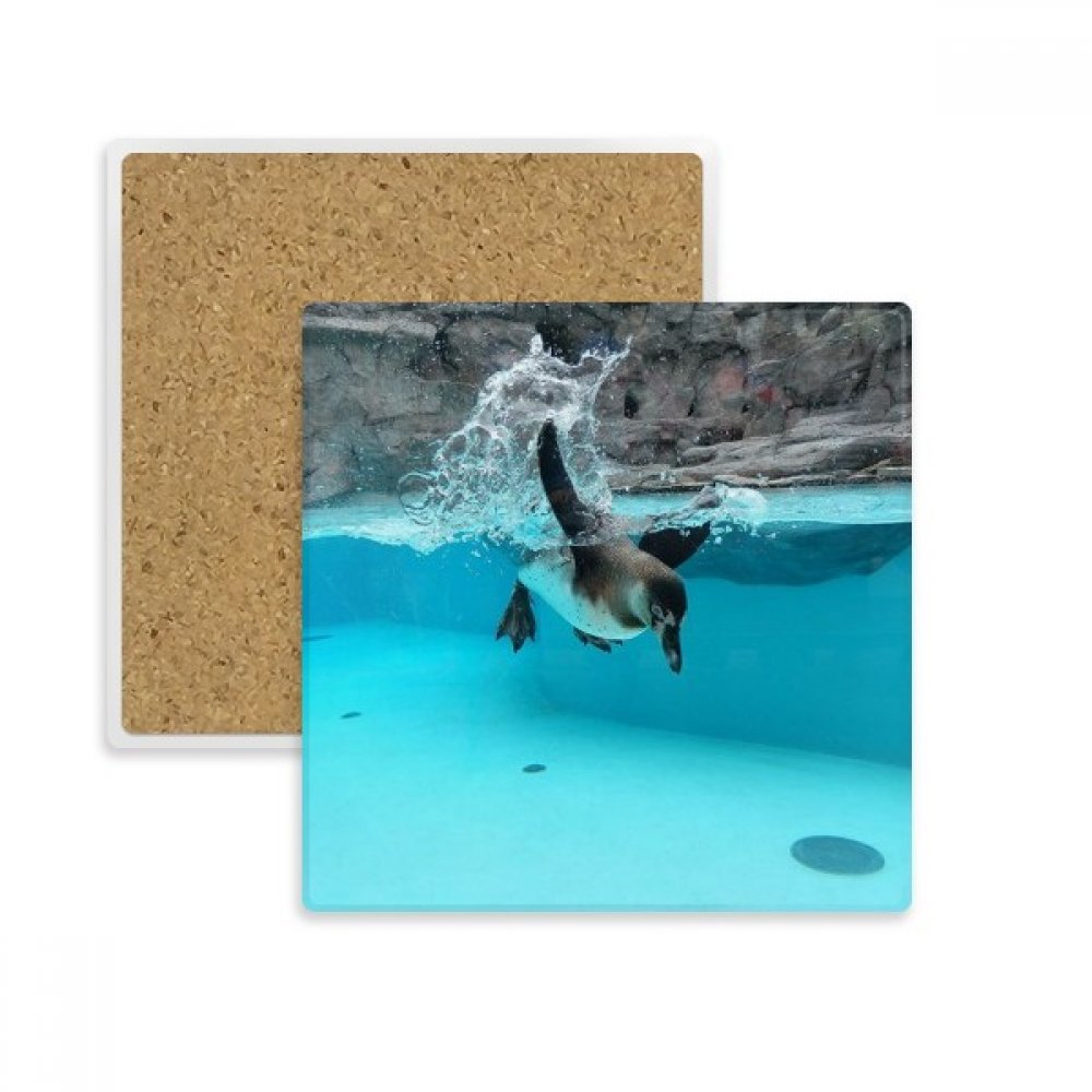 Dessous de verre absorbant en pierre naturelle avec motif pingouin océanique