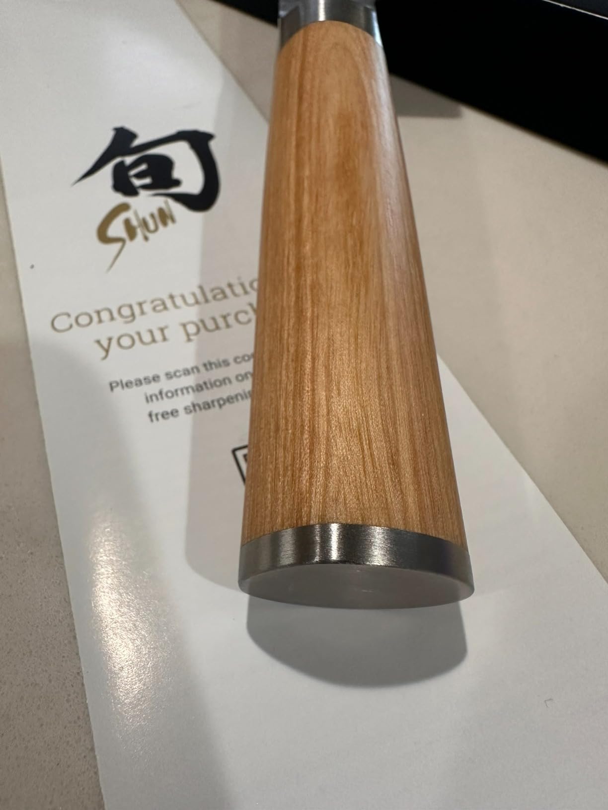 Shun Classic chef knife handle detail