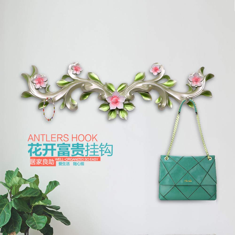 Crochet décoratif pour suspendre vos plantes et vestes sans encombre