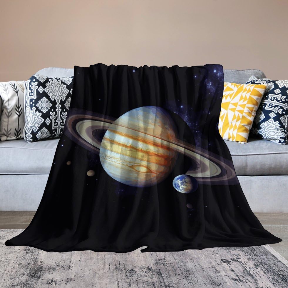 Couverture en micro polaire Jupiter pour des soirées cocooning confortables sur le canapé