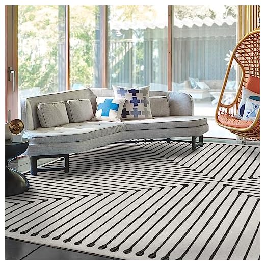 RUGGABLE x Jonathan Adler Washable Rug - Perfect Modern Area Rug for Living Room Bedroom Kitchen - Child Friendly - Stain & Water Resistant - Inkdrop Black & Ivory White 9'x12' (Standard Pad)
