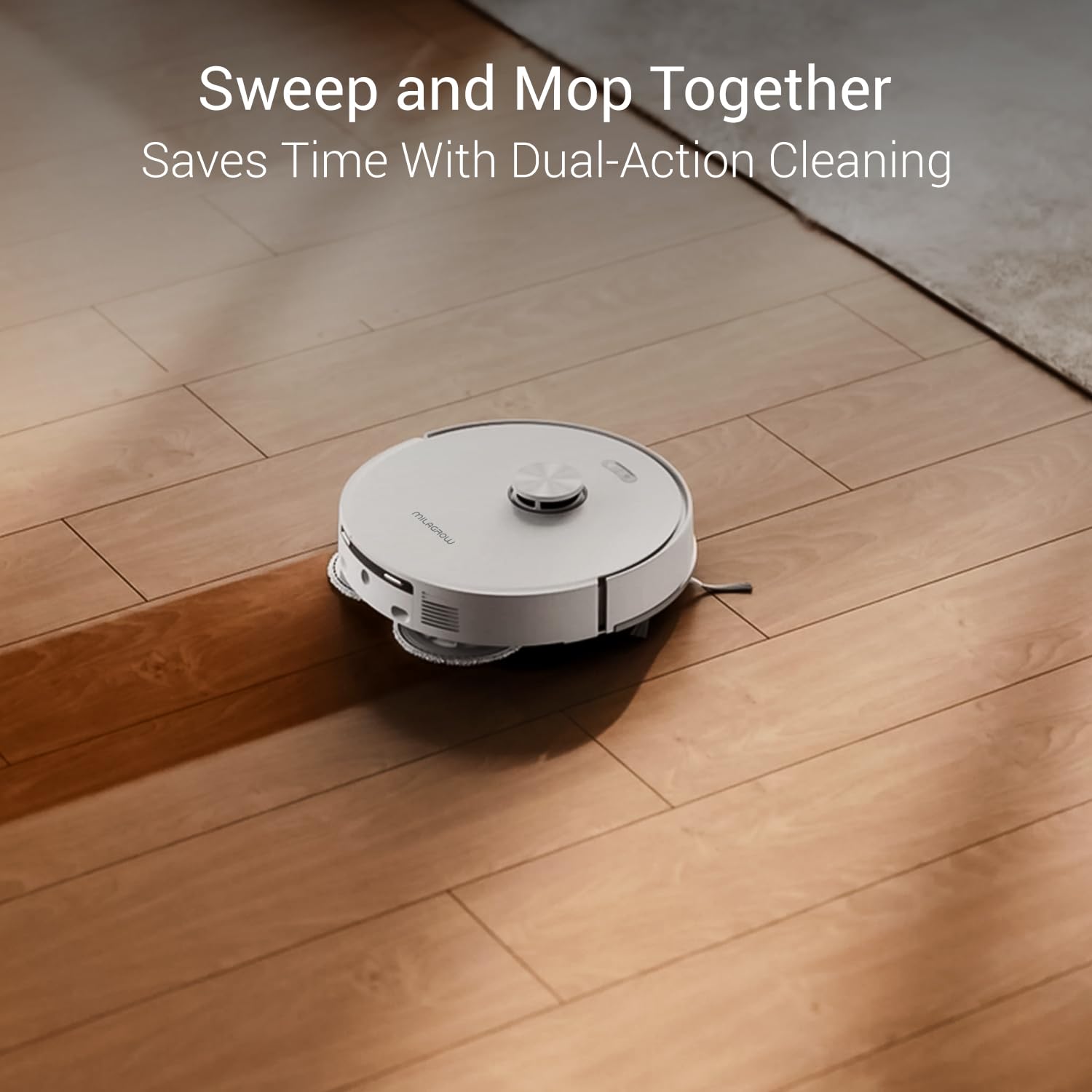 MILAGROW iMap Max W300 ECO robot vacuum sweeping and mopping simultaneously on a wooden floor.