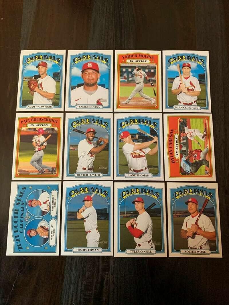 2021 Topps Heritage No SP Baseball St. Louis Cardinals Base MLB Hand Collated Team Set in Near Mint to Mint Condition of 12 Cards in 1972 Design6 Adam Wainwright 17 Yadier Molina 18 Yadier Molina In Action 103 Paul Goldschmidt 104 Paul Goldschmidt In Action 161 Dexter Fowler 259 Lane Thomas 296 Dylan Carlson Rookie In Action 303 Kodi Whitley, Roel Ramirez Combo Rookie 341 Tommy Edman 356 Tyler O'Neill 399 Kolten Wong