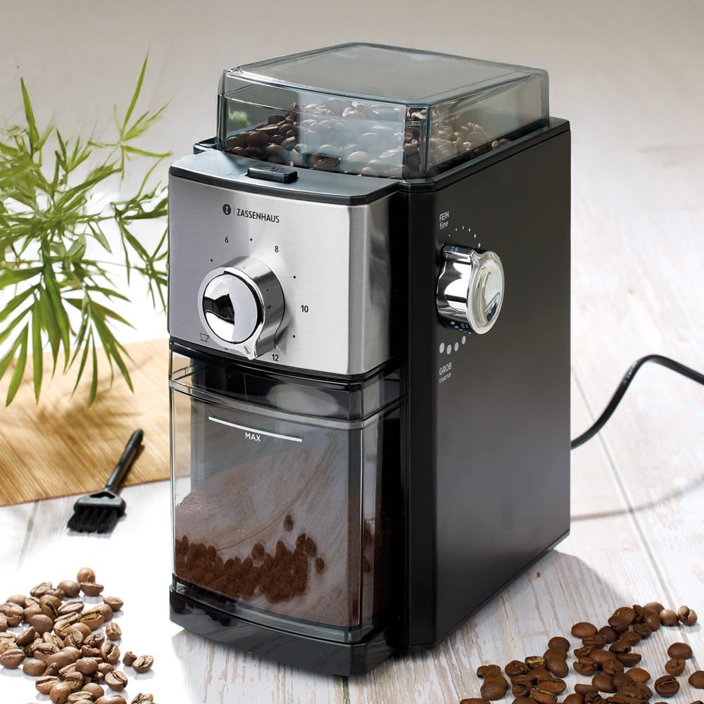 Zassenhaus Kingston Steel Automatic Electric Coffee Grinder in use with coffee beans and cleaning brush