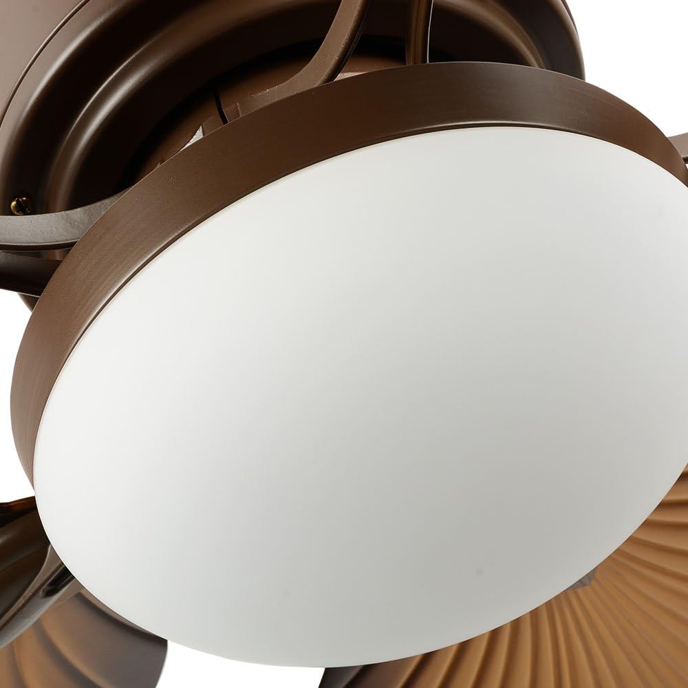 Close-up view of the milky white acrylic light shade of the ceiling fan.