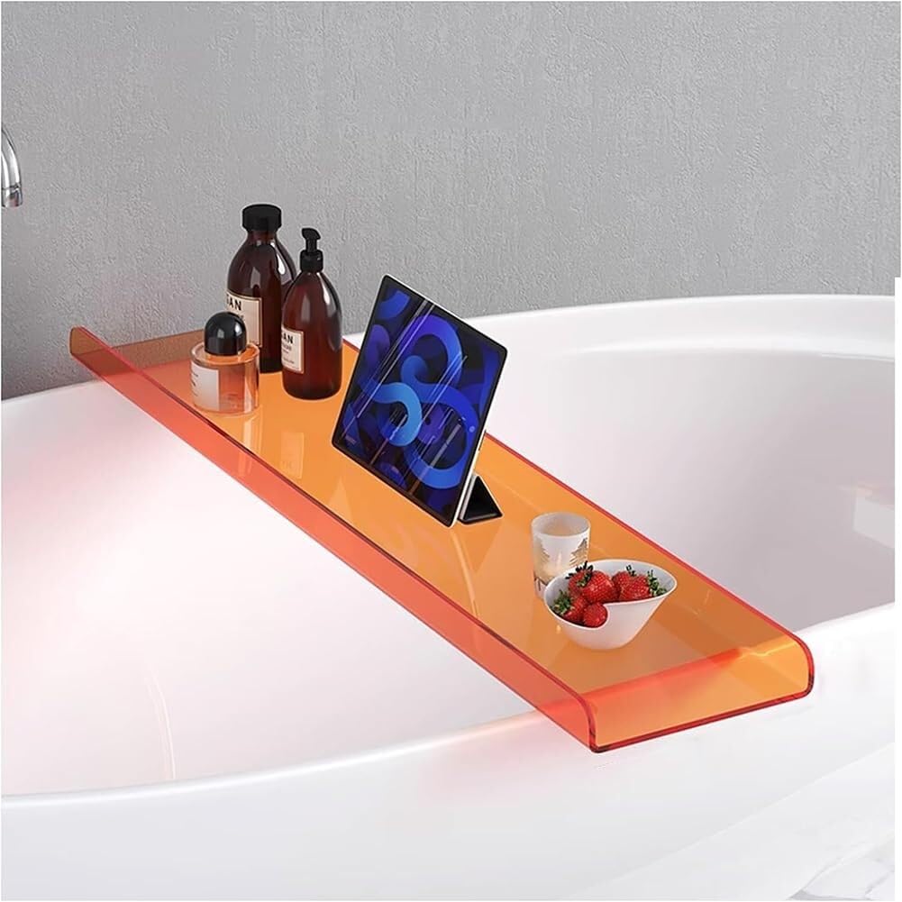 Mesa de baño de lujo con toallero de acrílico y botellero naranja