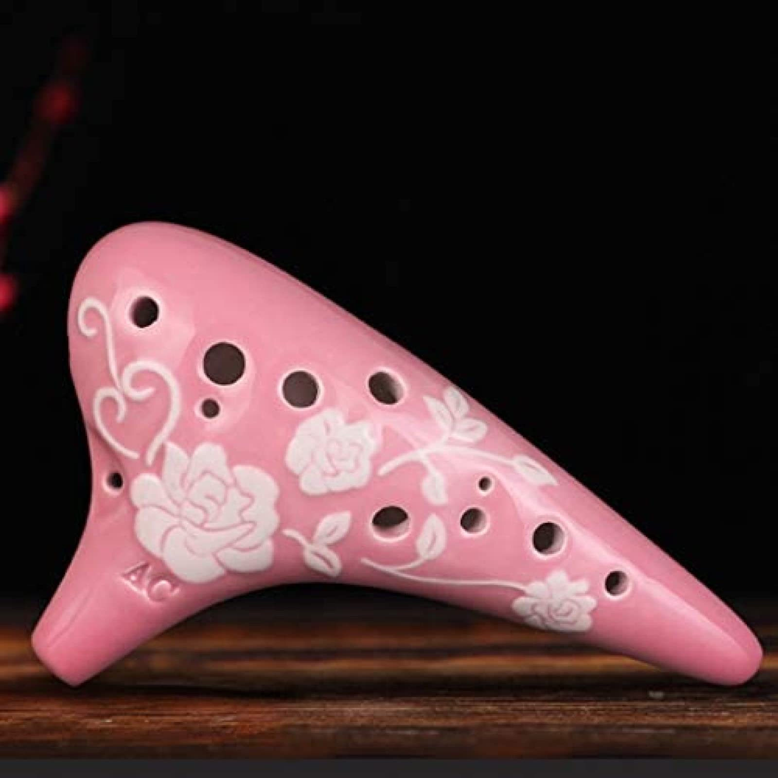 Ocarina em forma de submarino idílica em relevo de rosa