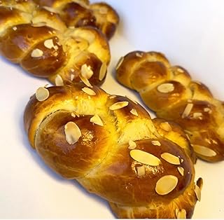 Hand-Braided Easter Brioche Bread with Sliced Almonds, Soft Sweet Loaf, Greek Tsoureki