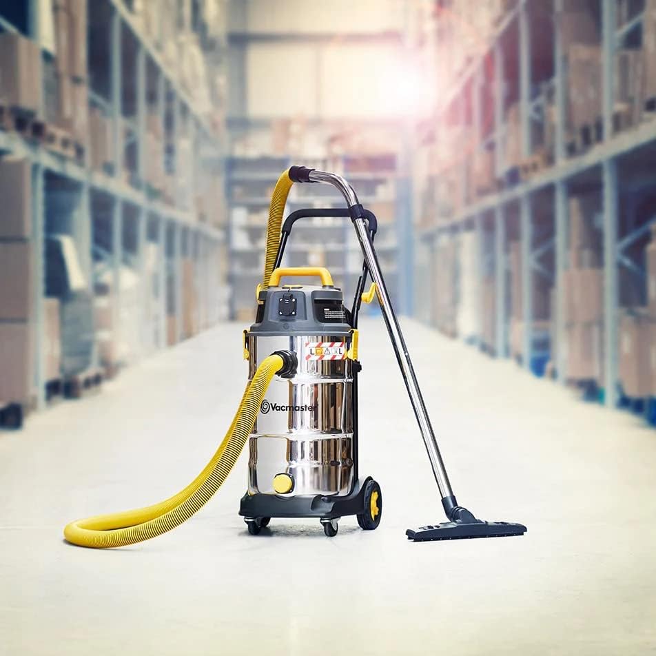 Vacmaster VK1638SWC vacuum cleaner with its wand and floor head attached, ready for use.