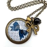 → Perle semi précieuse Sautoir Illustré Noeud Noir et Pois en Métal Bronze avec Cabochon en Verre, Breloque et Perle en Jade