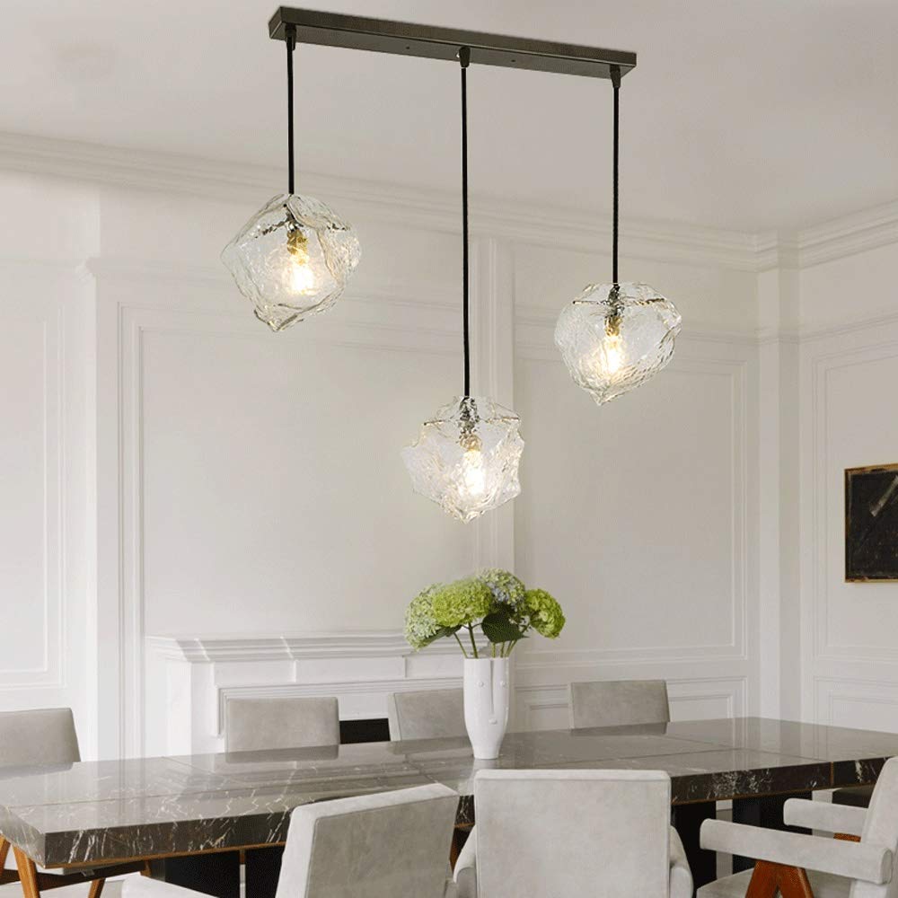 Lustre de luxe minimaliste pour éclairer un salon sombre