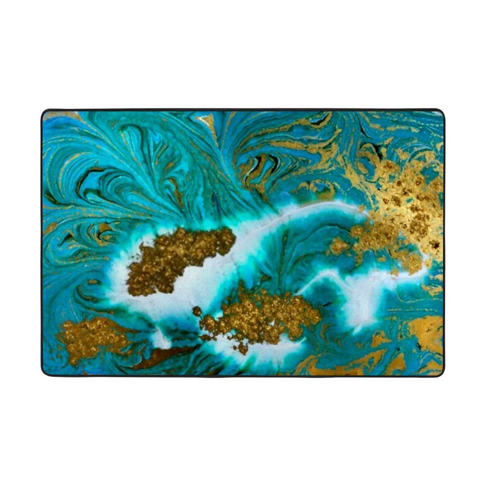 Tapis de salon bleu et vert marbré pour créer un coin détente cosy et moderne