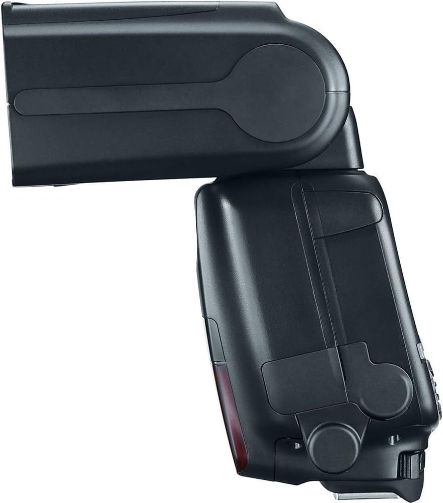 Страна view of the Canon Speedlite 600EX II-RT, showing the battery compartment door.