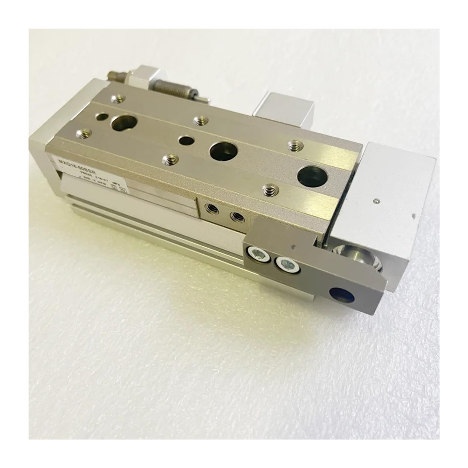 Vérin pneumatique MXQ6-10R pour stopper les chutes de pièces par perte d'air