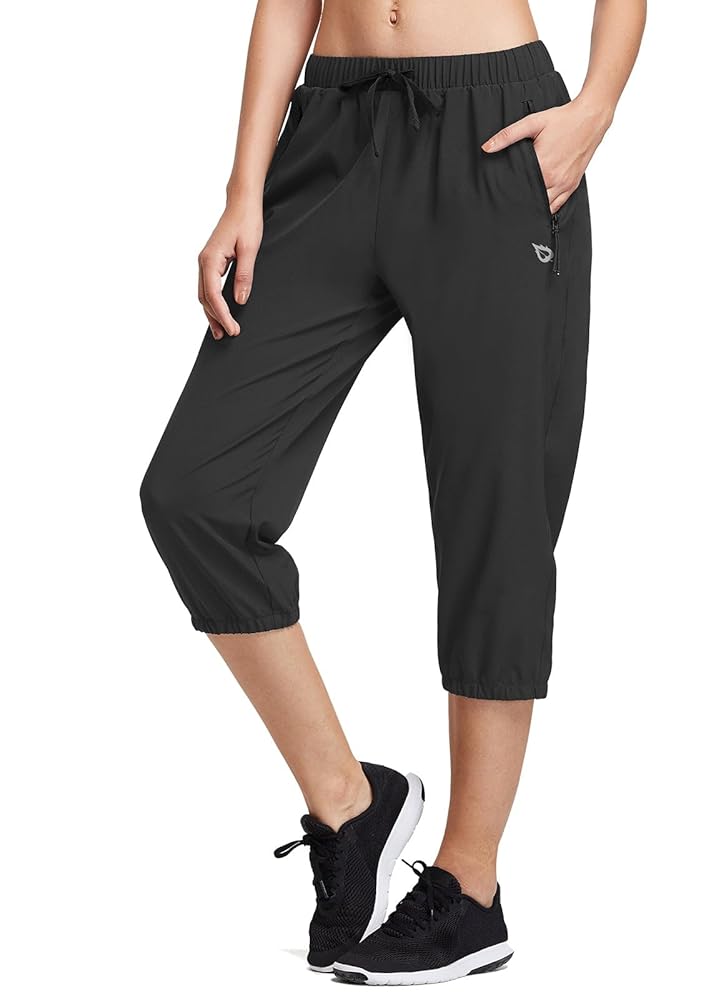 Women wearing convertible hiking pants on mountain trail