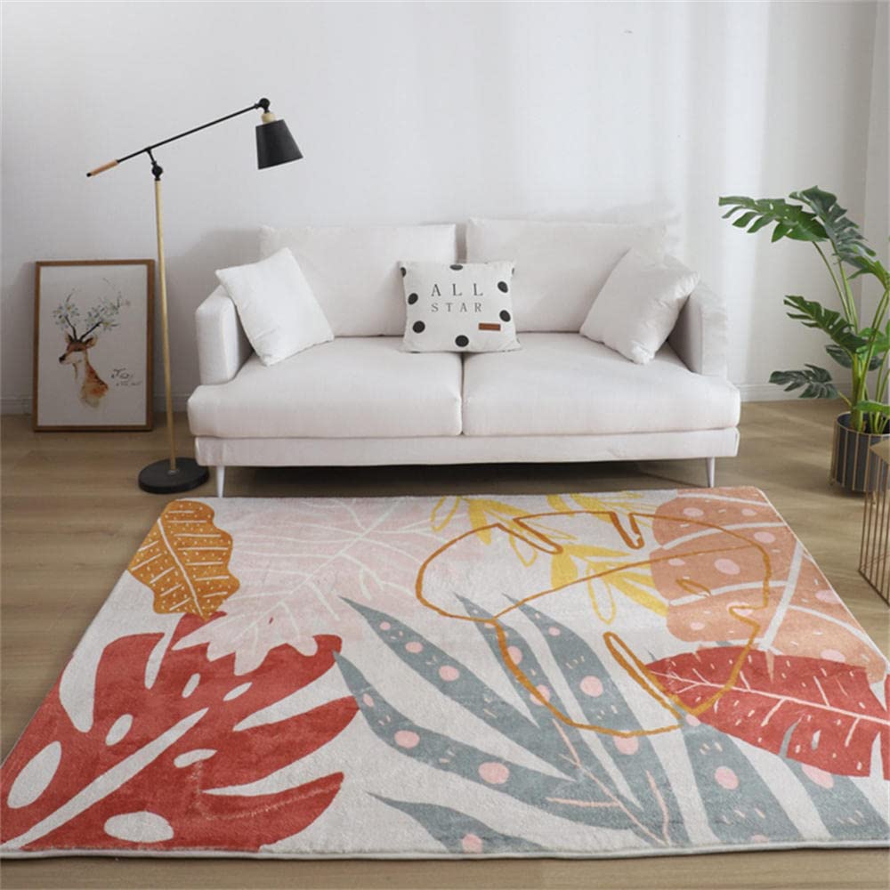 Tapis de salon et chambre enfant moderne pour égayer un sol sombre avec du gris rouge doré