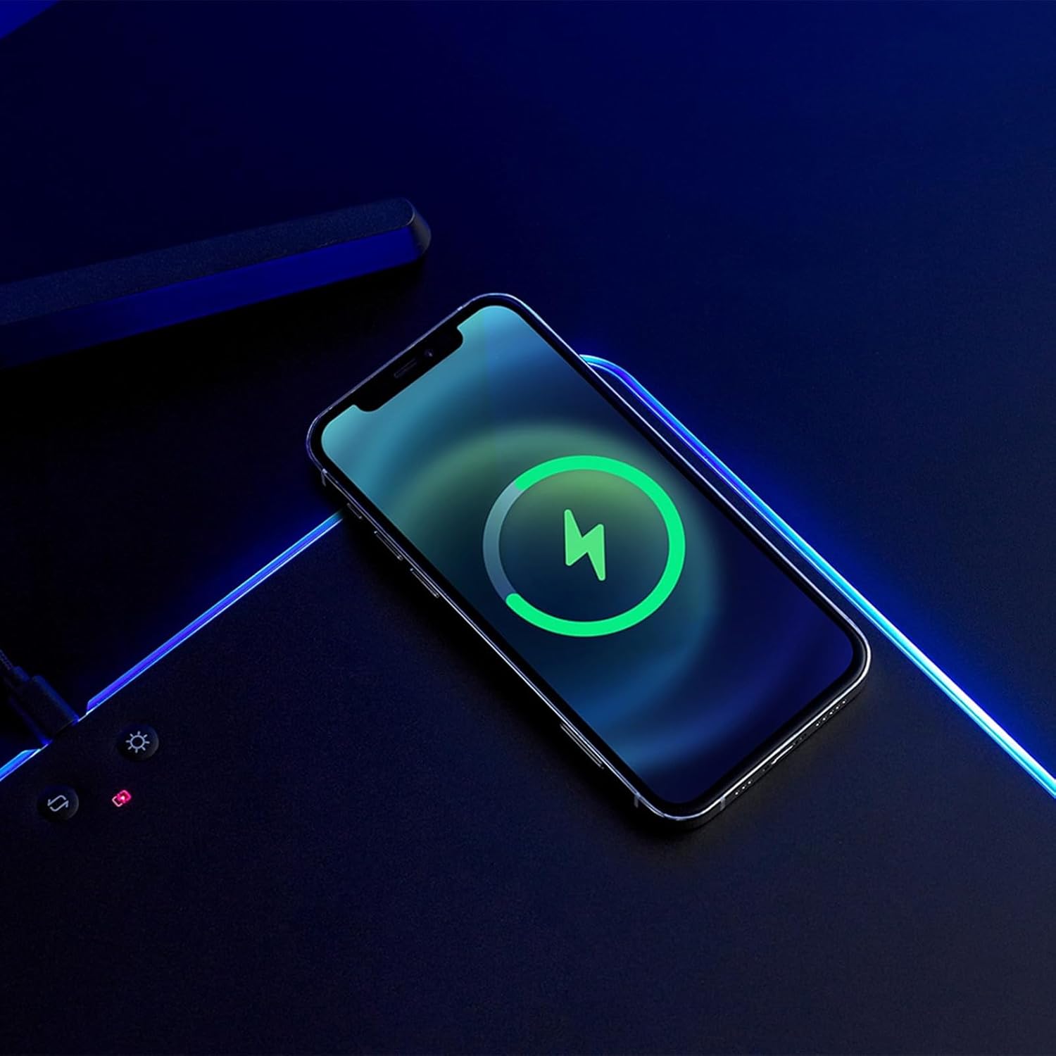 Smartphone wirelessly charging on the Rapoo V10RGB mouse mat
