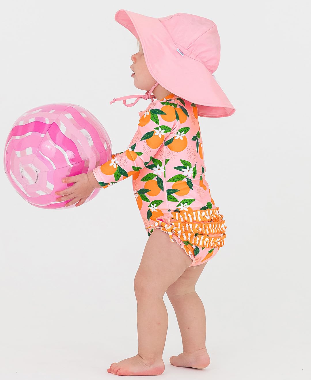 RuffleButts Traje de baño de una Pieza con protección Solar UPF 50 para niñas, Estampado novedoso, de Manga Larga y Cremallera, Color neón, 3-6 Meses