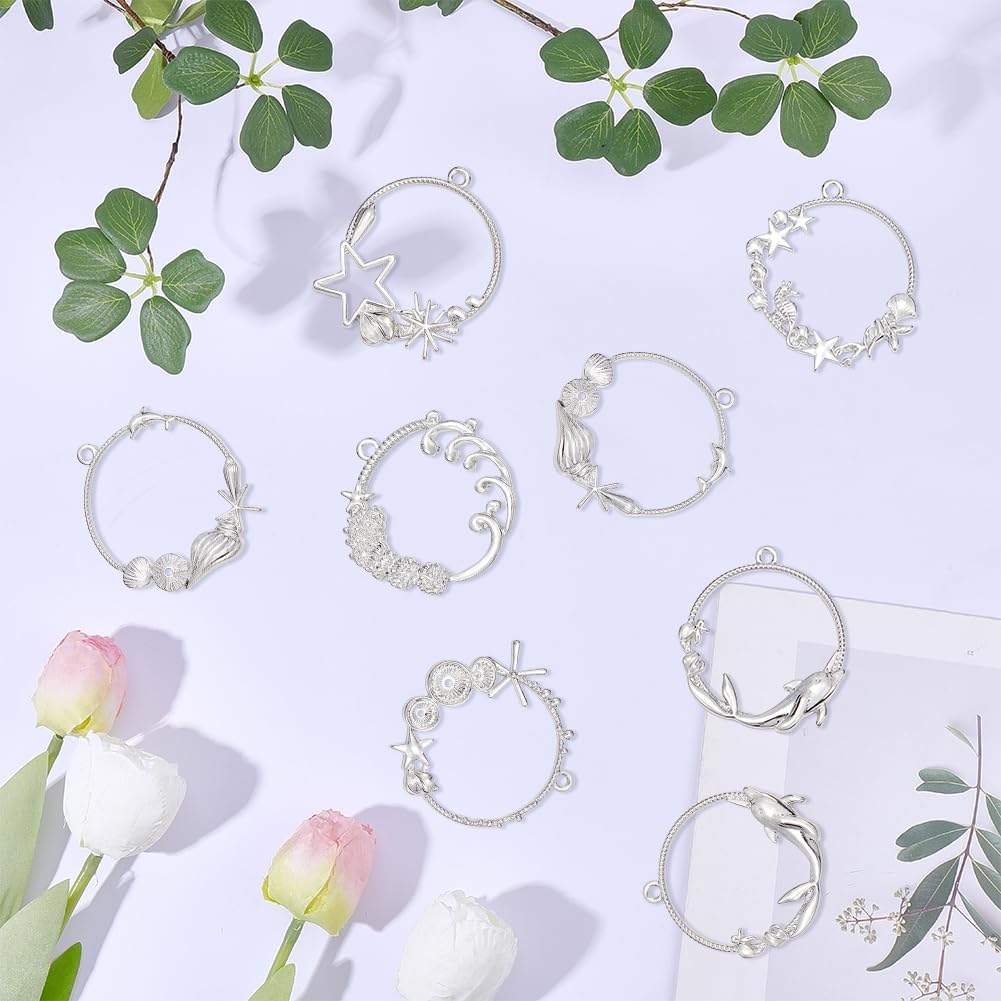 24Pcs 6 Styles Open Back Bezels Hollow Bezel Charms Alloy Silver Wave Star Shell Dolphin Summer Ocean Sea Themed Alloy Frame Pendants Rings for Resin Jewelry Earrings Necklaces DIY Crafts