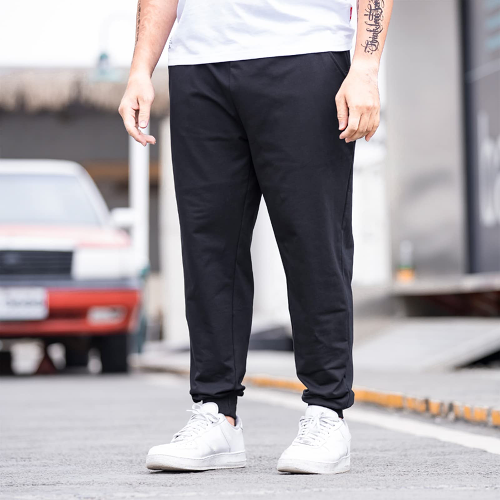 Uomo Taglie Forti Loose Fit Pantaloni Sportivi Affusolati in Cotone Pantaloni Casual Semplici (L-8XL)