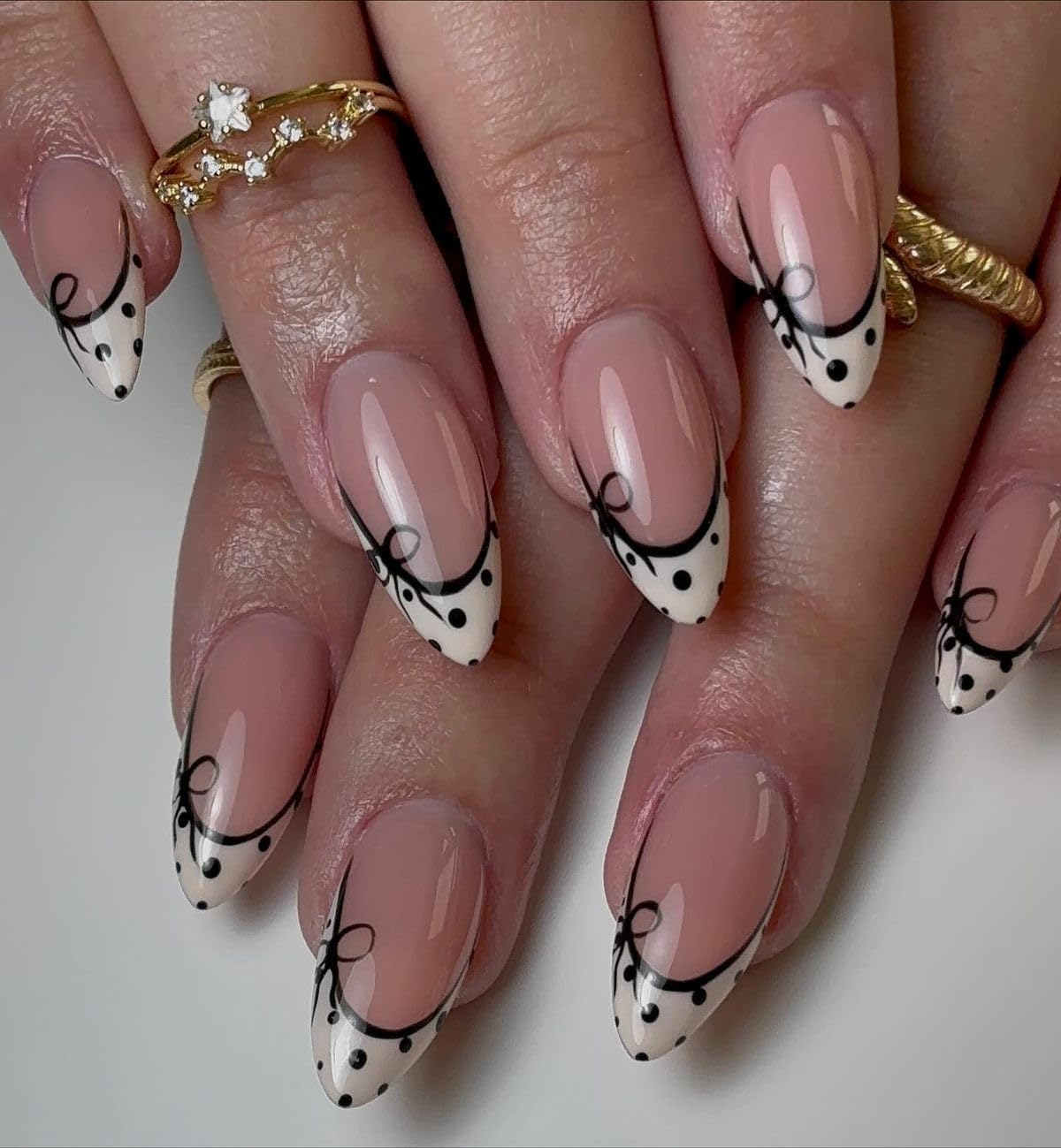 French Tip Press On Nails for Women | Nude Almond Shape Artificial Nails with Black Line Design Bow Brush Art | Glossy Reusable Fake Nails | Salon Style Stick On Nails Set of 12-image-31