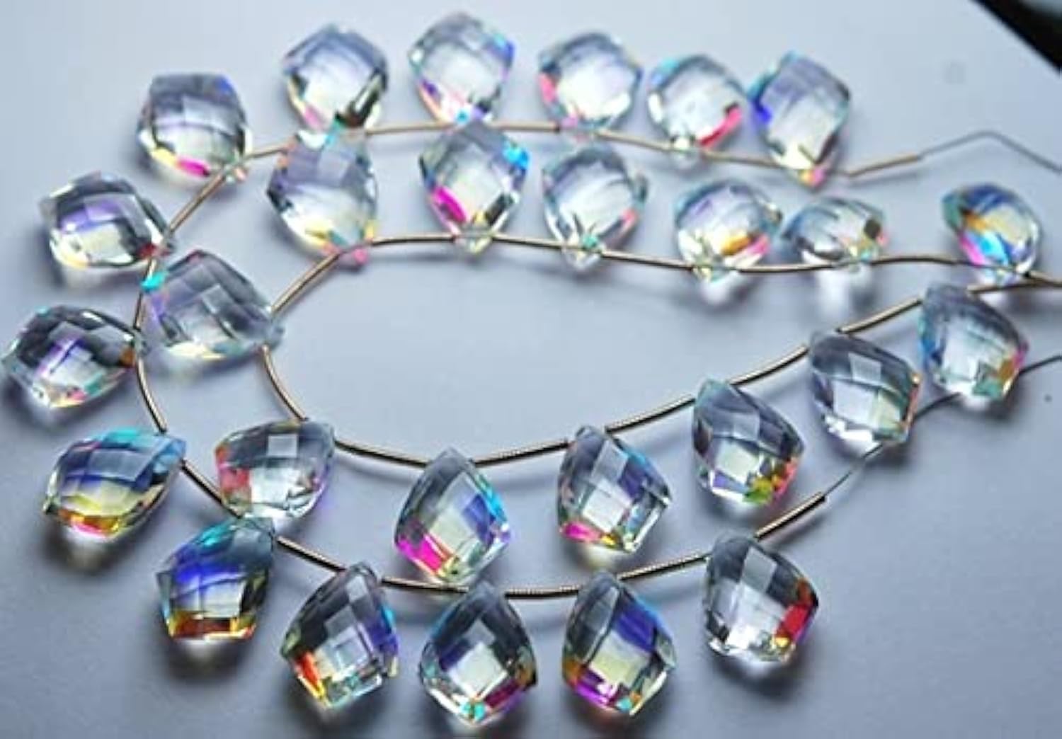 Quartz mystique briolette pour vos ateliers de création de bijoux bohèmes et colliers d'été