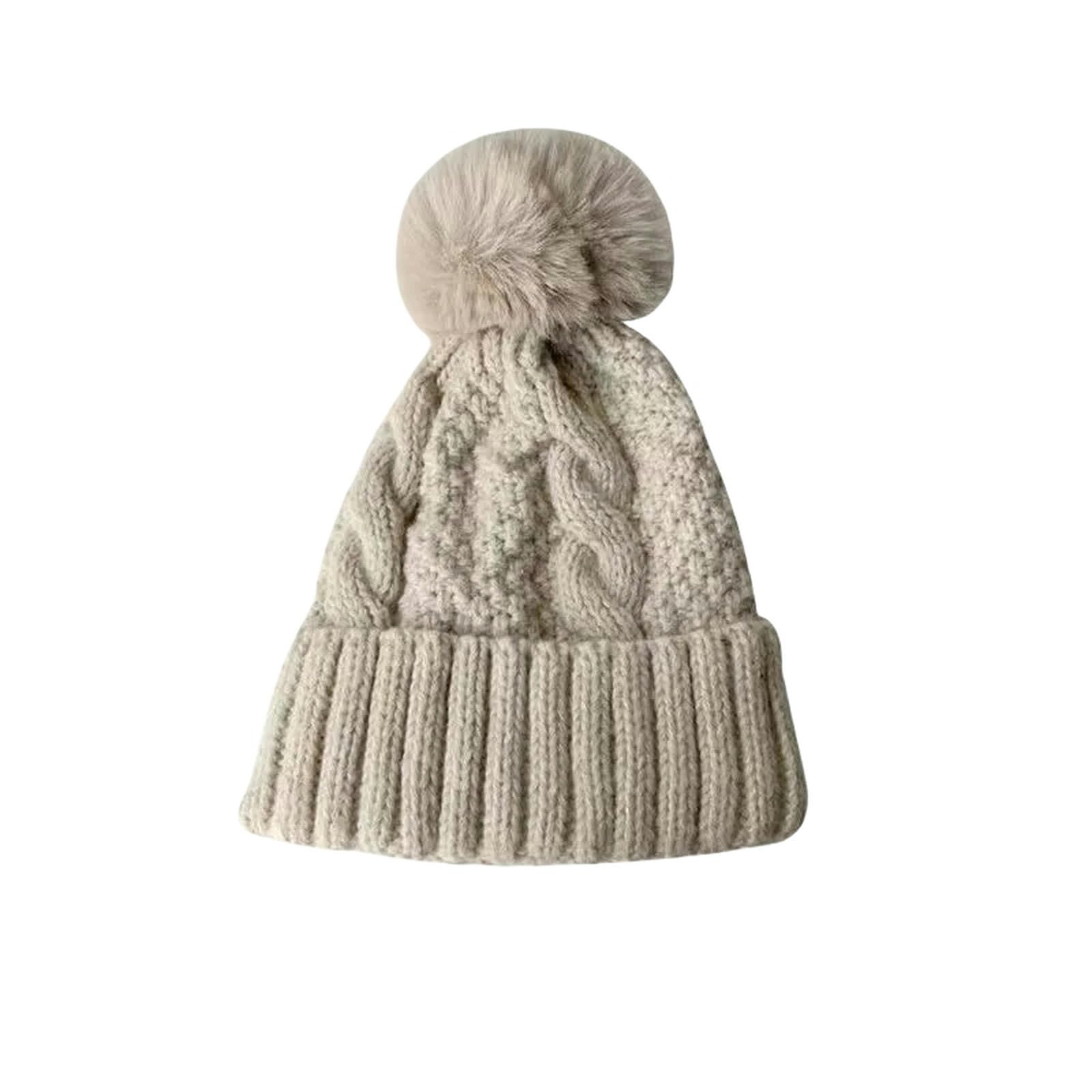Bonnet femme chaud tricoté torsadé d'hiver avec pompon peluche beige