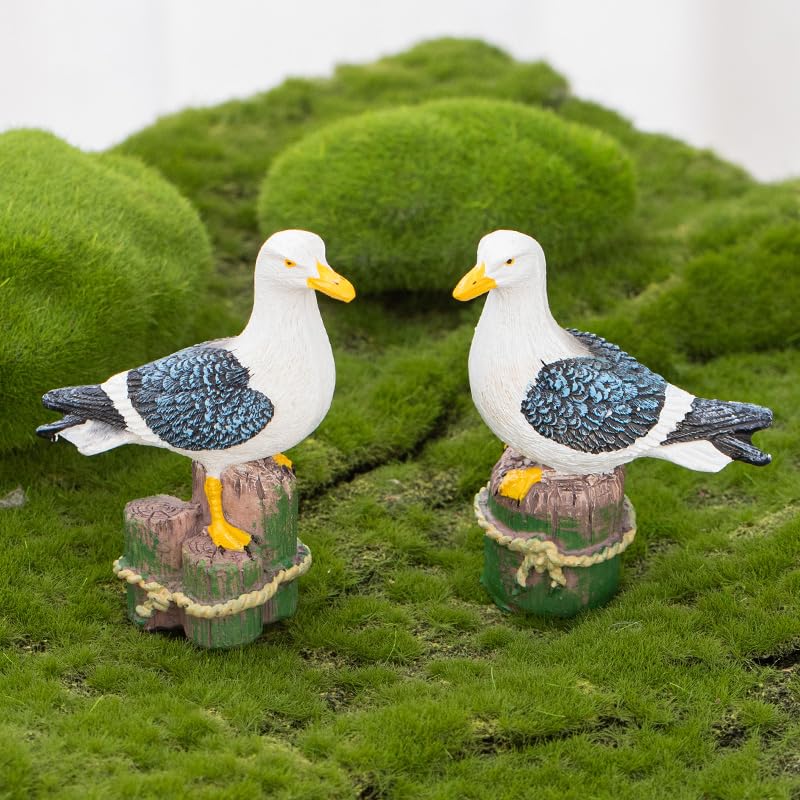 Par de mini gaviotas de resina decorativas