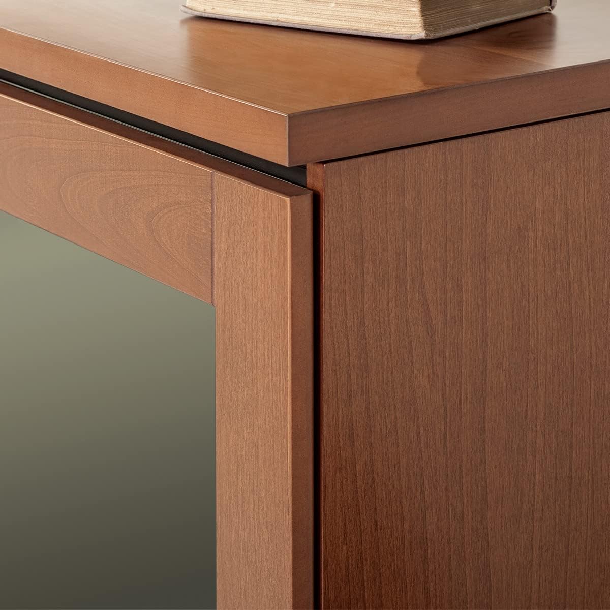 Avvicinamento view of the Salamander Chameleon ELBA 323 AV Cabinet's American Cherry wood finish and door detail.