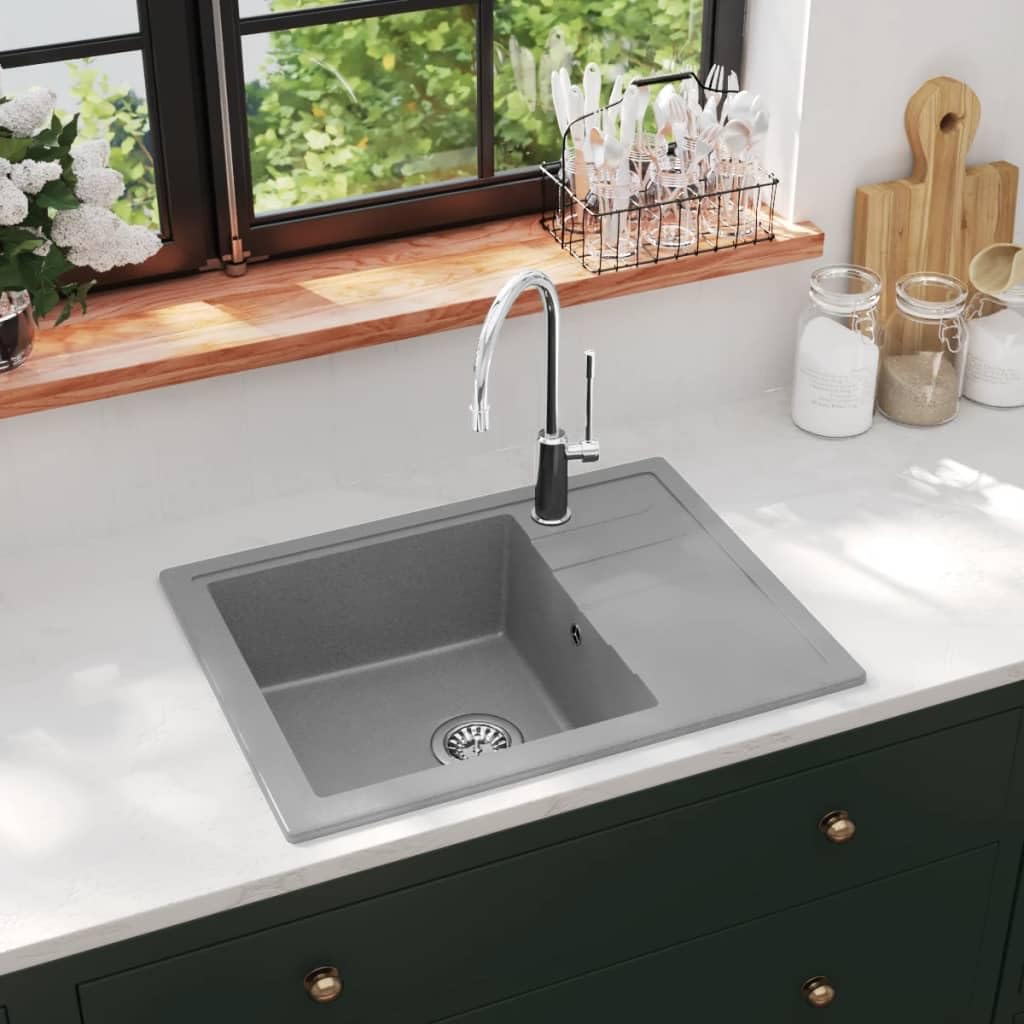 Fregadero de cocina ovalado de granito gris con desbordamiento y accesorios
