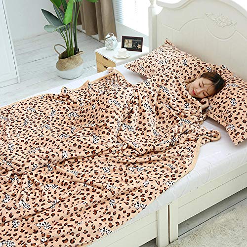 Couverture flanelle épaisse léopard grand format pour lit et sieste